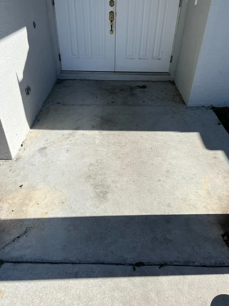 Front patio with bare concrete before the Apex coating installation